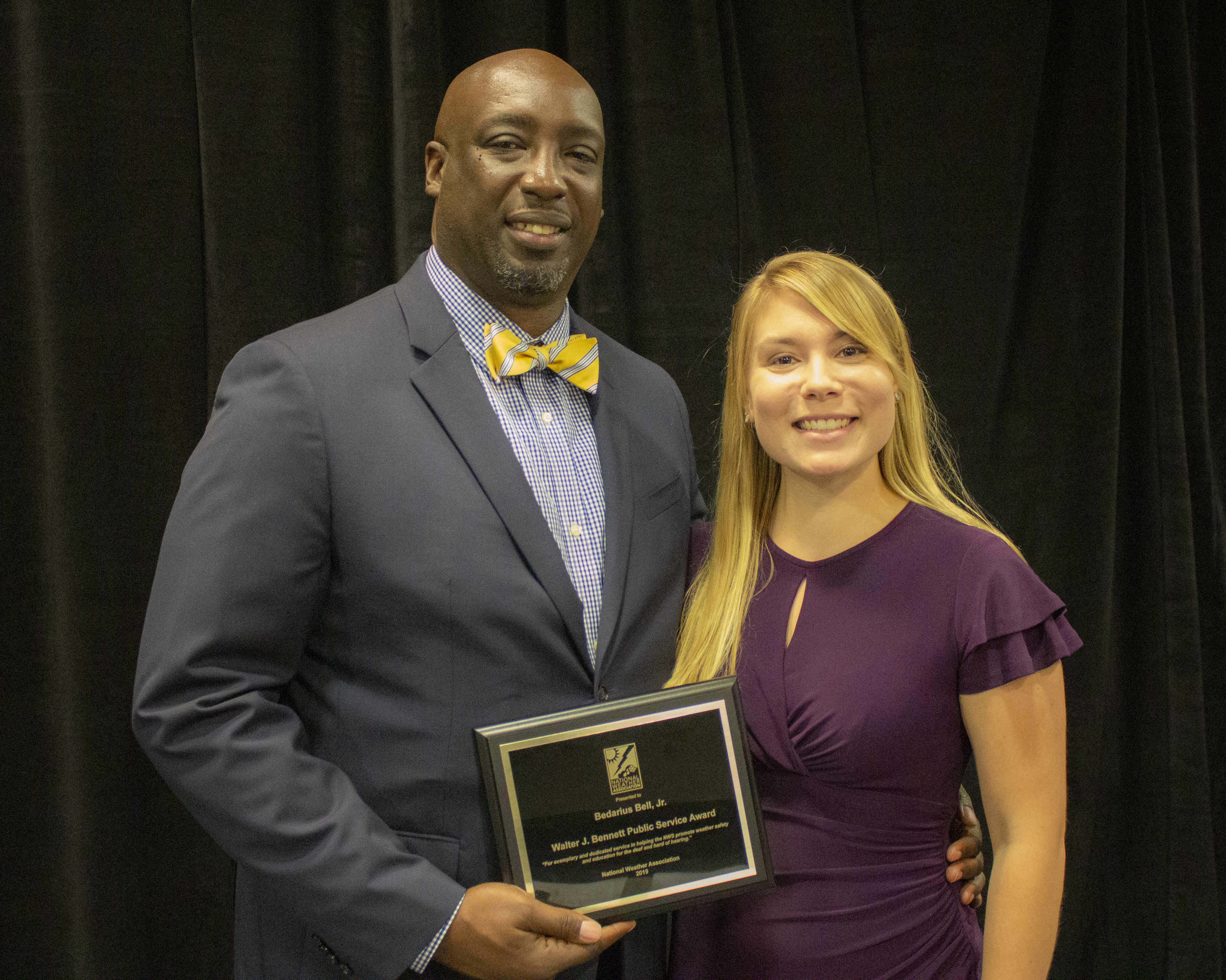 Bedarius Bell Jr. with Jennifer Saari, who nominated Bell for the "Walter J. Bennet Public Service Award."